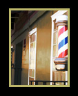 Barbershop poles are the focus of a cityscape thumbnail